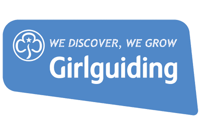 Blue Girlguiding logo with white trefoil symbol and the words